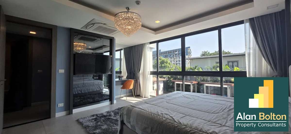 Modern 3-Bedroom Condo at Serenity Residence Jomtien | Pool View photo 10