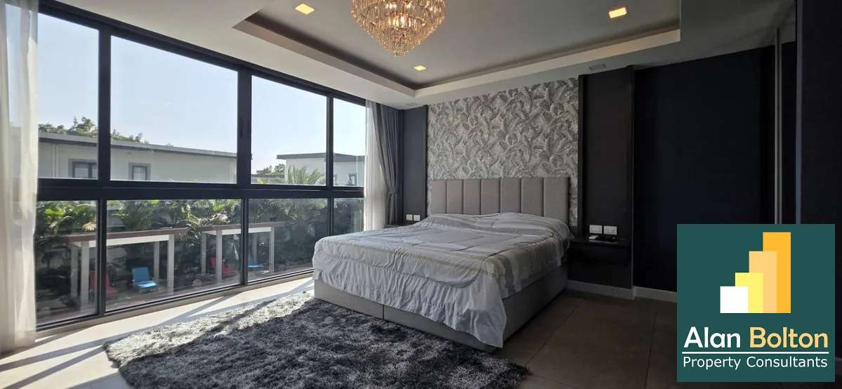 Modern 3-Bedroom Condo at Serenity Residence Jomtien | Pool View photo 9