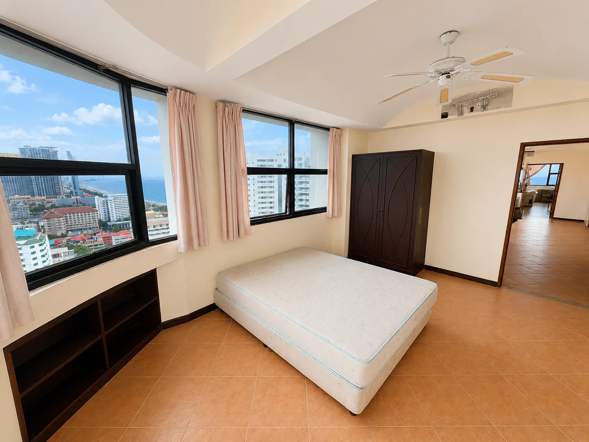 Spacious Two-Bedroom Two Bathroom Corner Unit on a High Floor In Need of Complete Renovation in Popular Jomtien Condominium photo 6