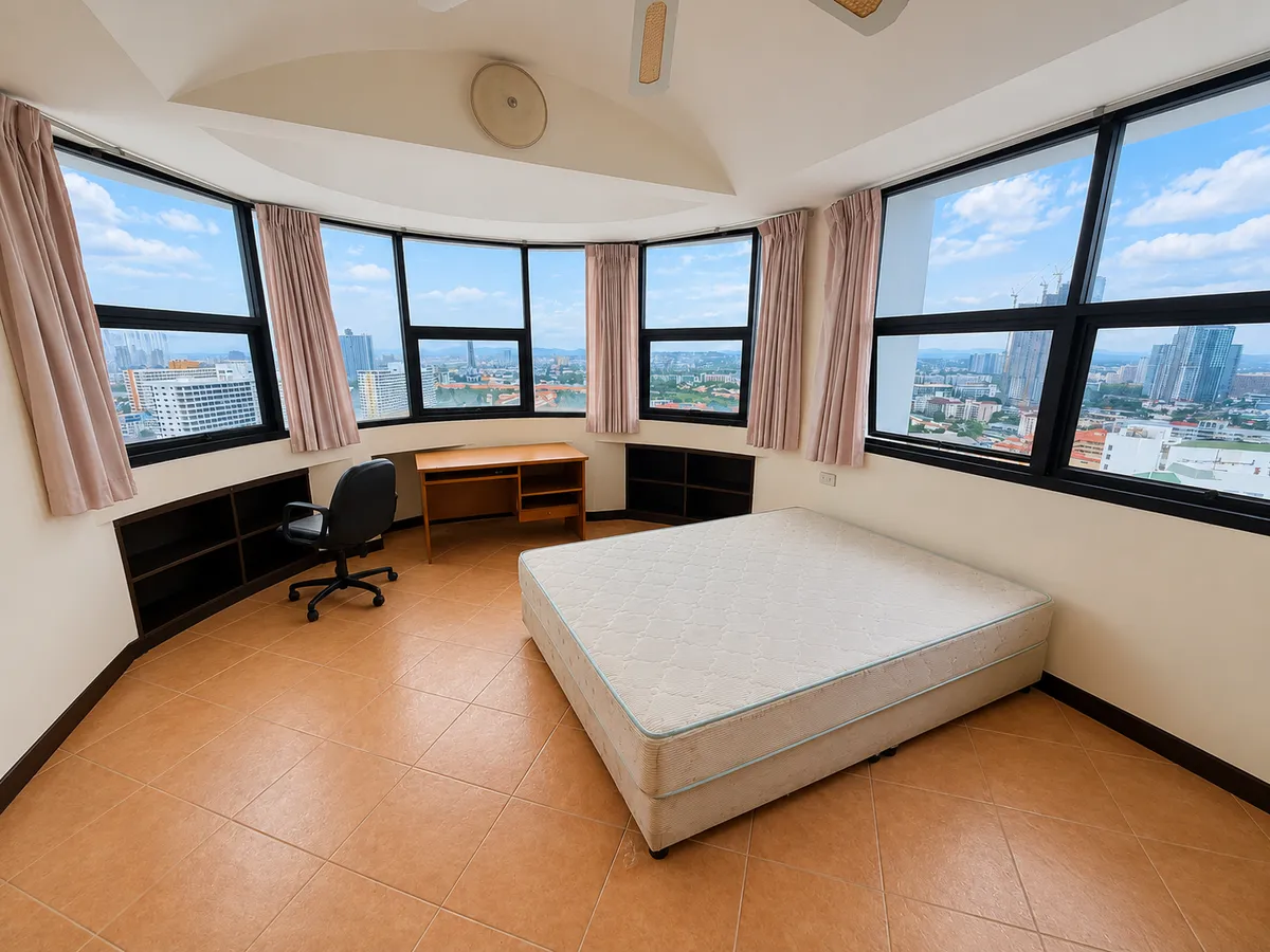 Spacious Two-Bedroom Two Bathroom Corner Unit on a High Floor In Need of Complete Renovation in Popular Jomtien Condominium photo 7