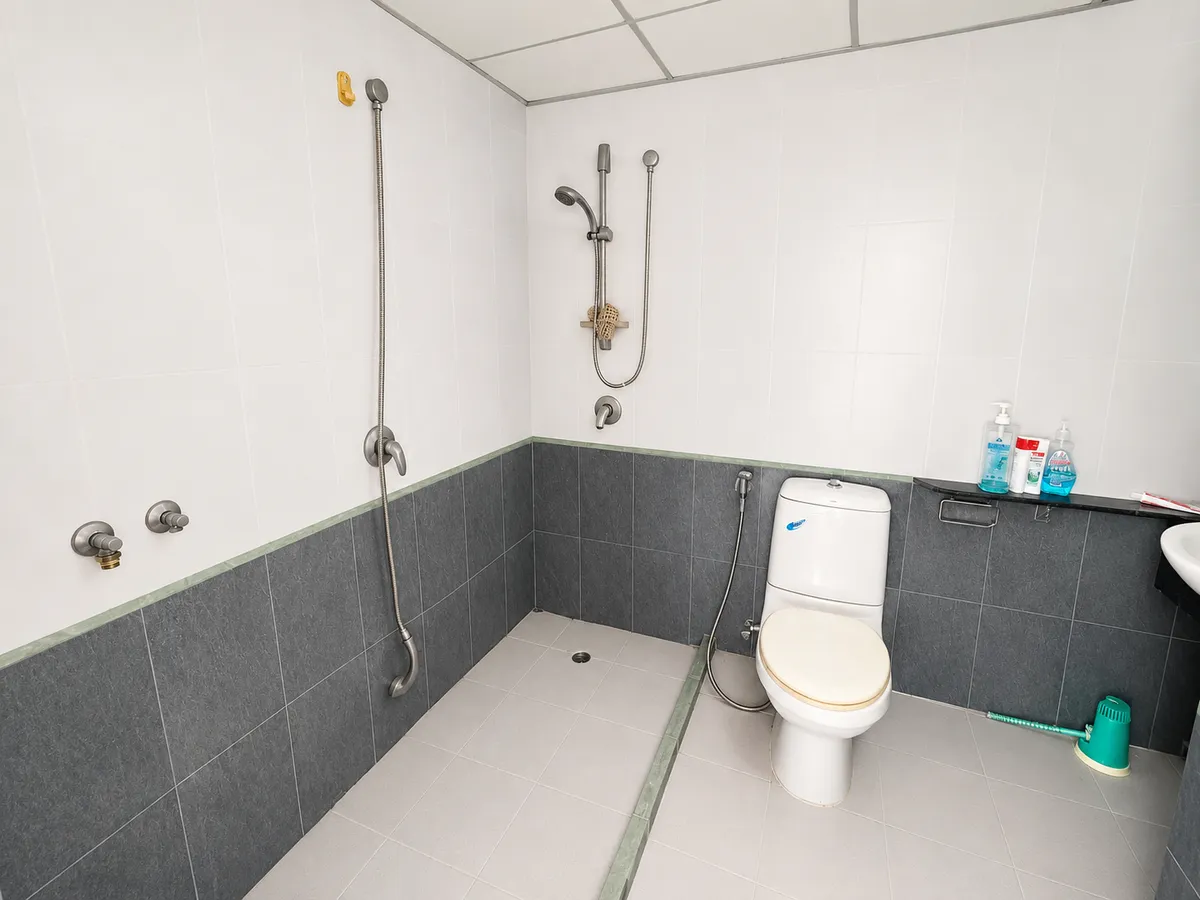 Spacious Two-Bedroom Two Bathroom Corner Unit on a High Floor In Need of Complete Renovation in Popular Jomtien Condominium photo 5