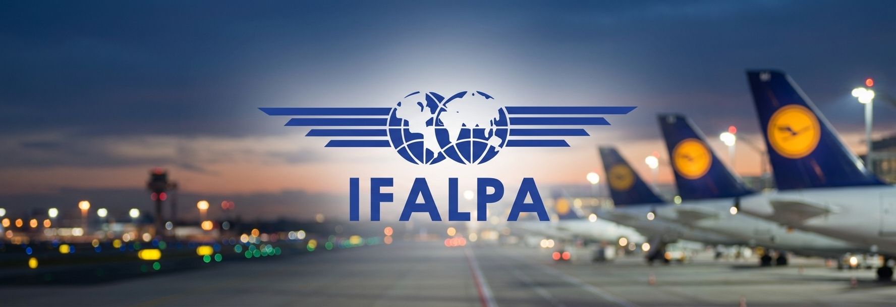 IFALPA logo at dusk over blurred Lufthansa planes at an airport.