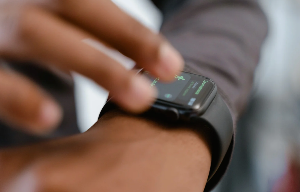 Use of Smartphones and Wrist-Worn Devices for Motor Symptoms in Parkinson’s Disease