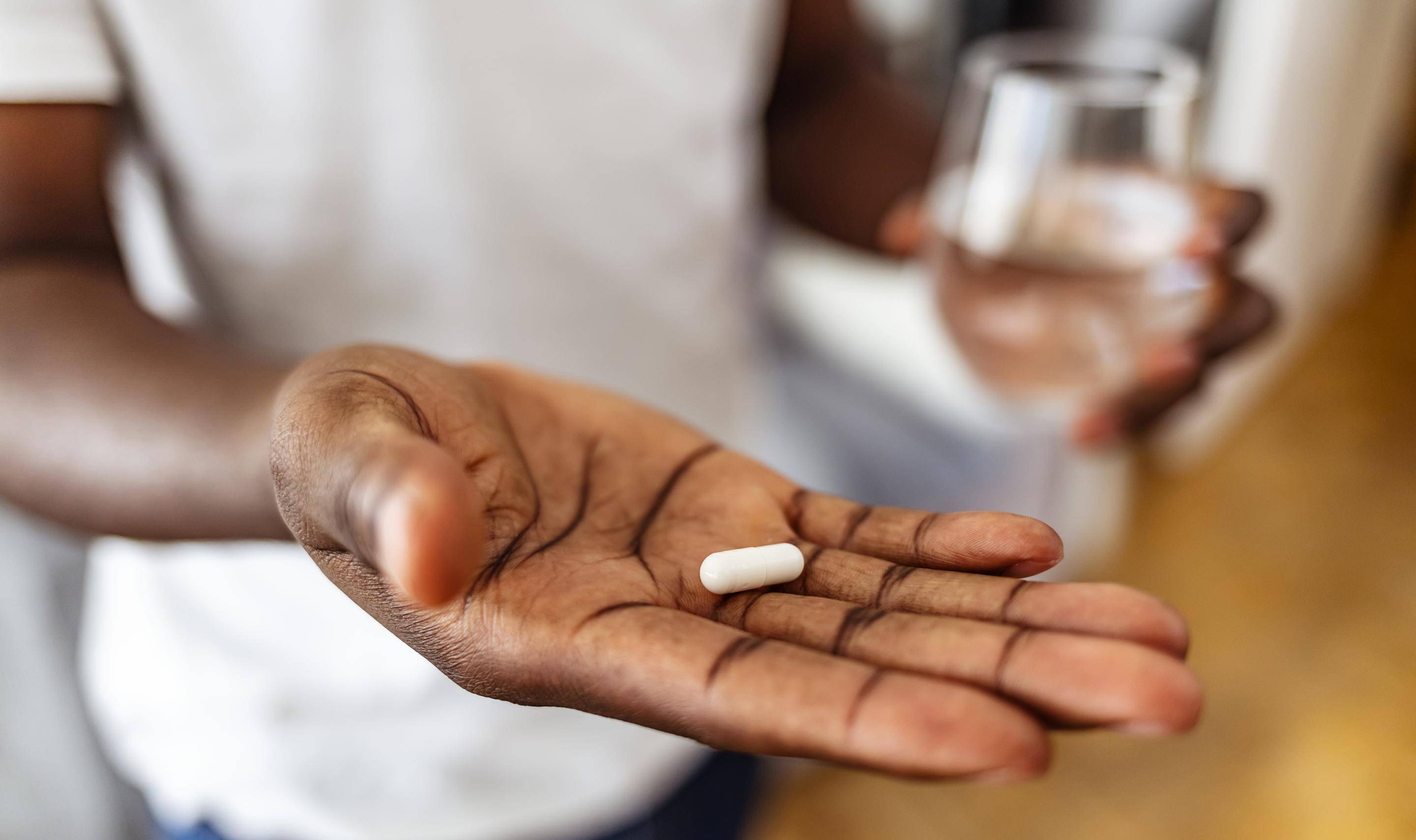 The best way to take a pill, according to science