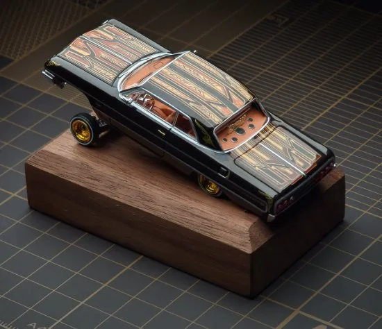 97M 1:64 Chevrolet Impala Lowrider. Brown with graphics