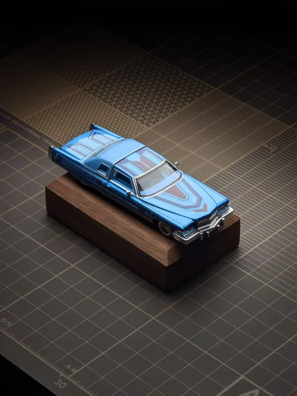 97M 1:64 1975 Cadillac Coupe DeVille Lowrider Metallic Blue with graphics