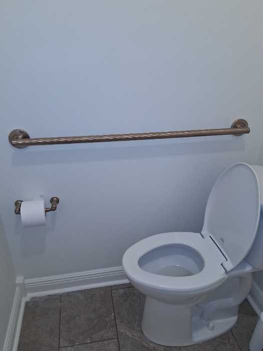 Installed ADA compliant grab bars in bathroom attached pull handle in Flowood, MS, photo 5