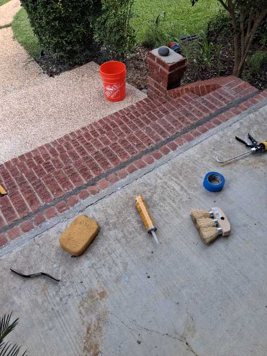Seal cracks in front porch mortar joints between ports in Madison, MS, photo 2
