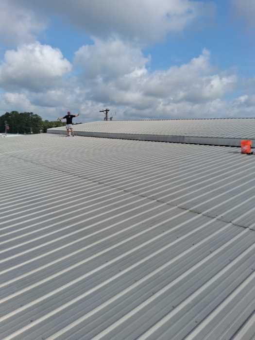 Replacing metal roofing screws with oversized in Magee, MS