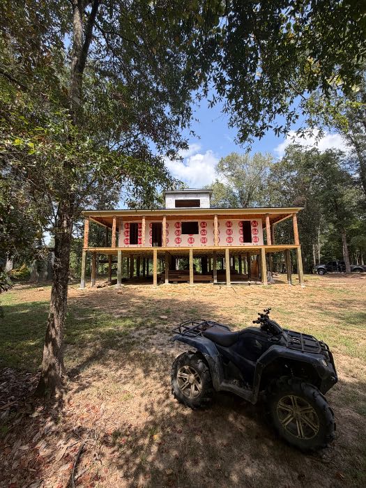 New constructionputting up Cedar log columns in Terry, MS, photo 2