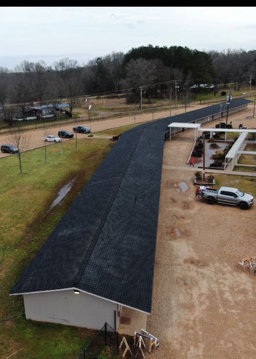 Remove old roof and install new HD Z roof system synthetic felt high-rise ridge vent in Crystal Springs, MS