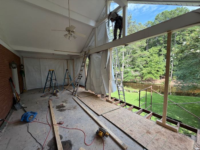 Hanging tarps, getting ready for rain to move in Pearl, MS