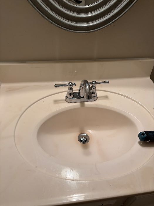 Replace 2 bathroom faucets, replace shower valve, patch wall and paint in Florence, MS