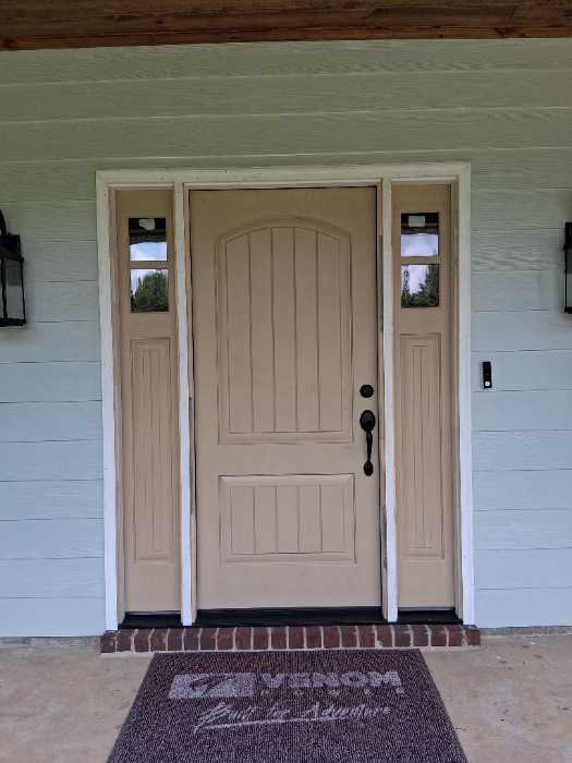 Remove old exterior door install new custom double light prehung front door in Magee, MS