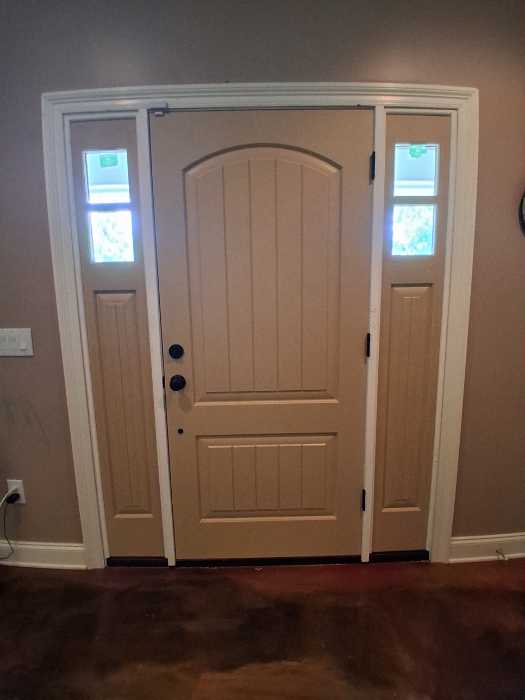 Remove old exterior door install new custom double light prehung front door in Magee, MS, photo 2