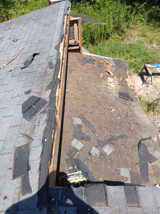 Demoing a damaged roof in Terry, MS, photo 2