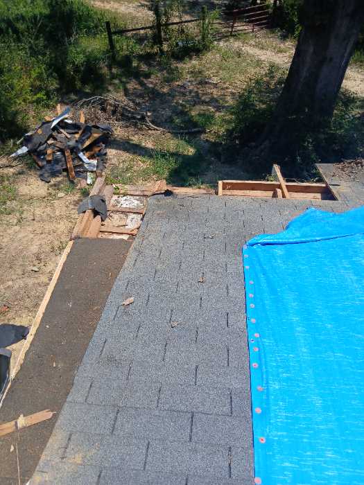 Demoing a damaged roof in Terry, MS, photo 4