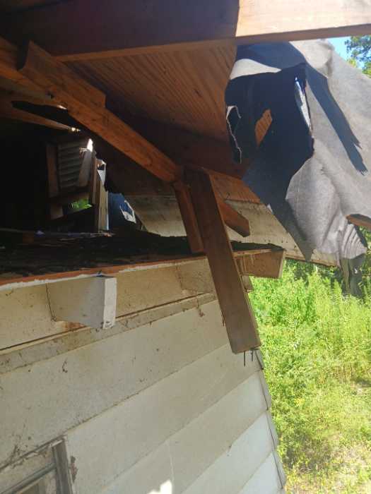 Demoing a damaged roof in Terry, MS, photo 6