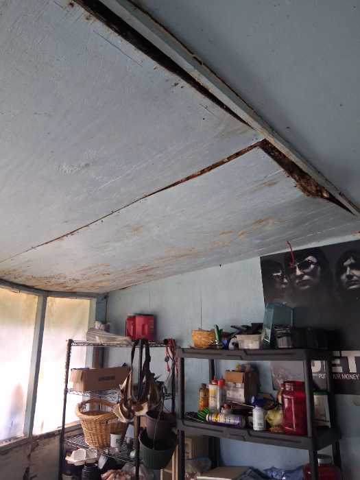 Replacing damaged soffit under back porch replacing old rotten insulation in Jackson, MS, photo 5