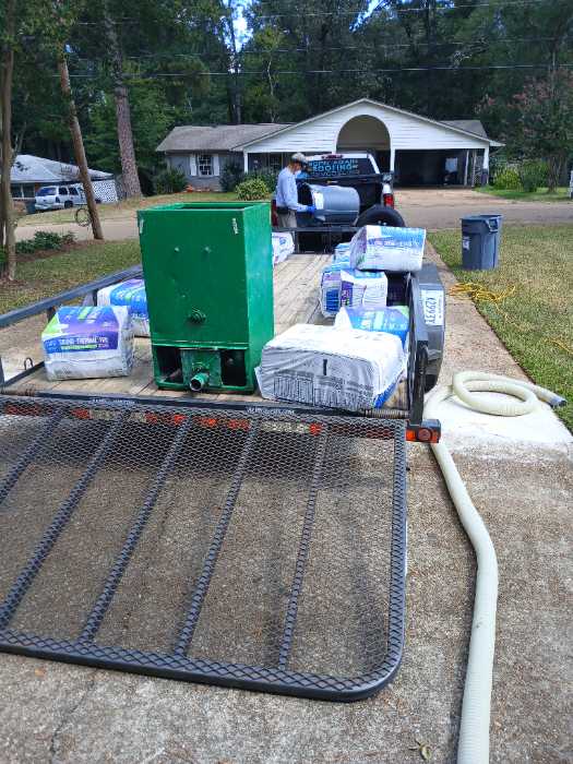 Spraying, instant insulation in an attic in Pearl, MS