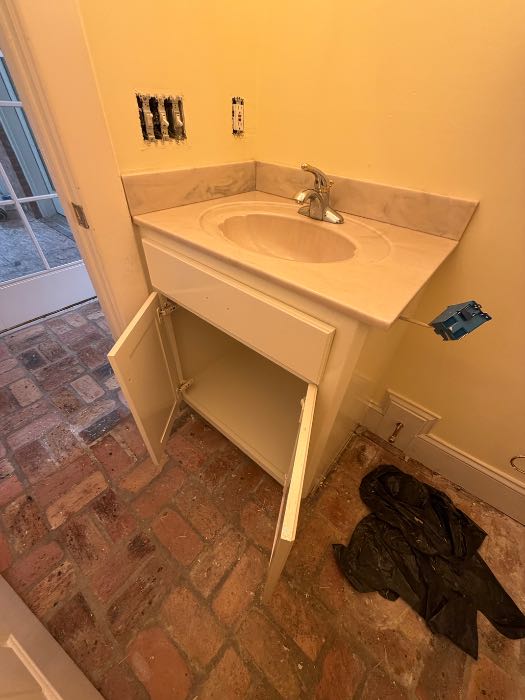 Rebuilt, new vanity painted back installed old countertop in Pearl, MS