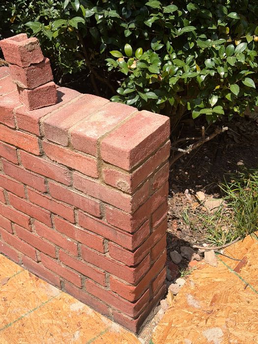 Repaired broken brick on top of corner on wall and top of columns and wing wall on steps in Pearl, MS, photo 4