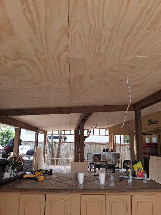 Installing soffit under porch in Canton, MS