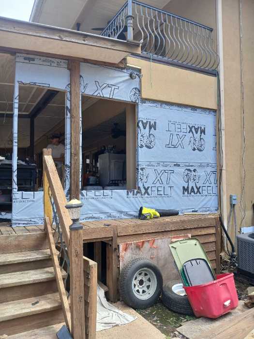 Wrapping the outside with house wrap in Canton, MS, photo 4