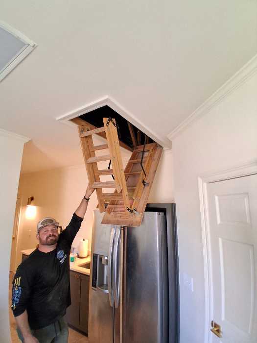 Adjusted attic stairs built landing reattached hardware in Flowood, MS