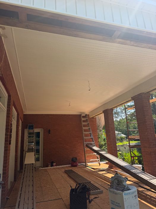 Installing new vinyl under porch ceiling in Pearl, MS, photo 2