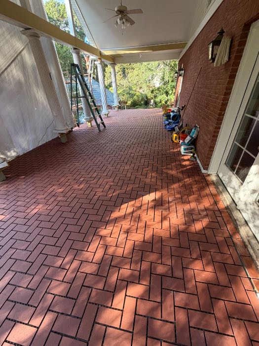 Installing new herringbone brick pavers in Pearl, MS