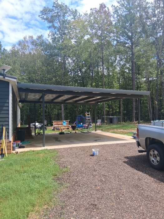 Painting custom color trim to match metal roof install in Florence, MS, photo 2