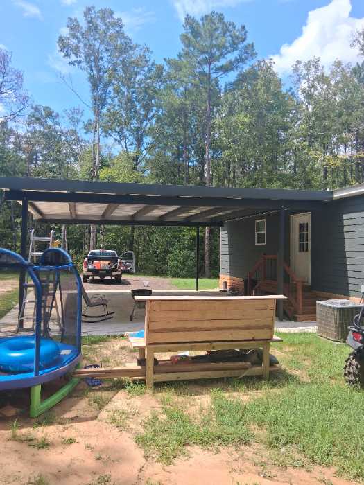 Painting custom color trim to match metal roof install in Florence, MS, photo 3