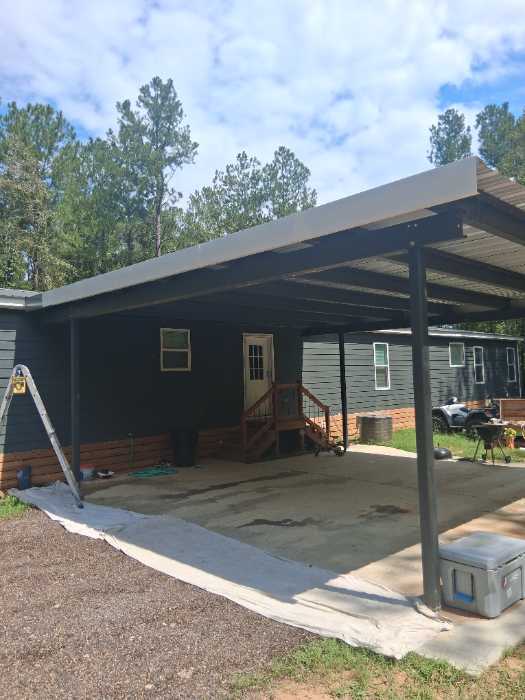Painting custom color trim to match metal roof install in Florence, MS, photo 4