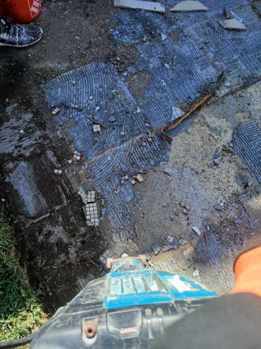 Taking up concrete of a back quarter in Brandon, MS