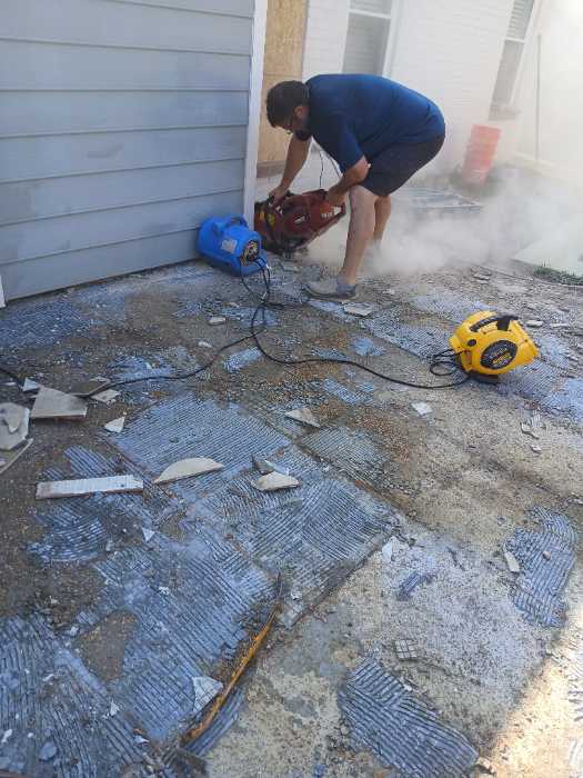 Taking up concrete of a back quarter in Brandon, MS, photo 2