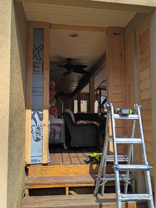 Putting siding up in Canton, MS