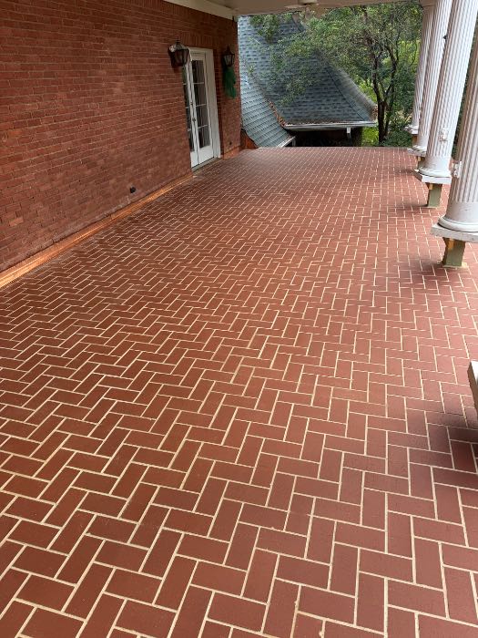 Install new brick paper herringbone pattern floor in Pearl, MS