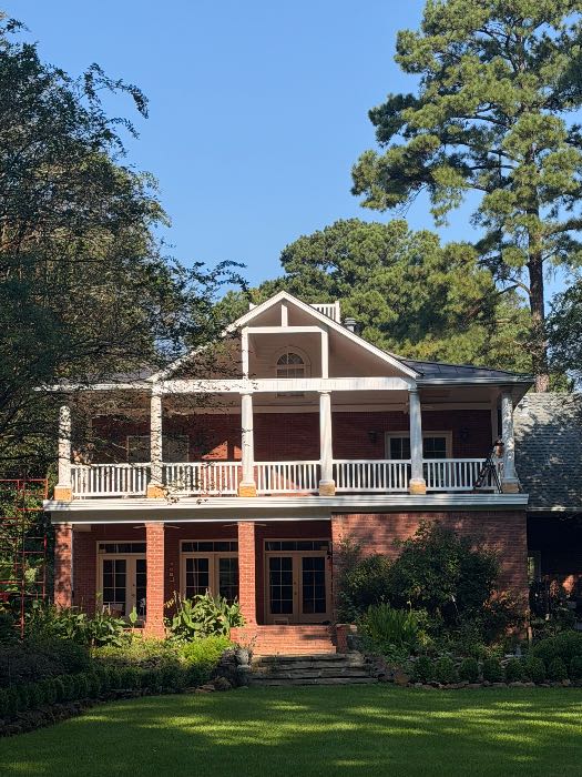 Installing old handrails back on newly remodeled upper floor porch in Pearl, MS