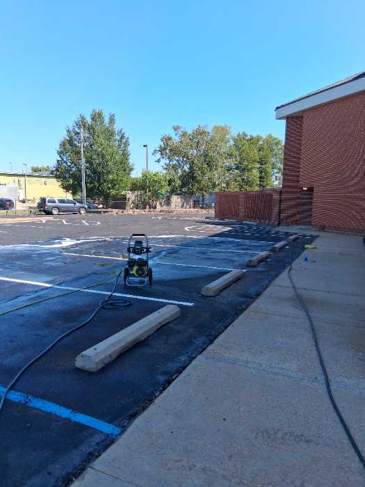 Pressure washing parking lot in Richland, MS