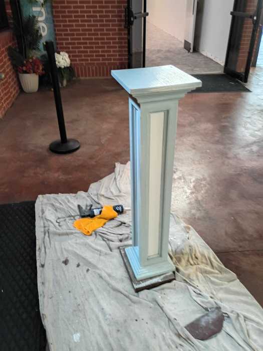 Caulking and painting a wooden podium in Richland, MS, photo 2