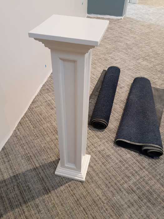 Caulking and painting a wooden podium in Richland, MS, photo 3