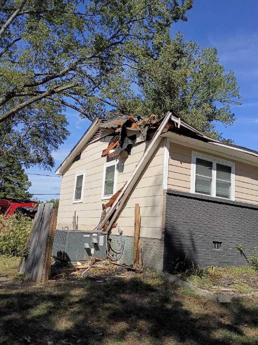Tarping a roof in Pearl, MS