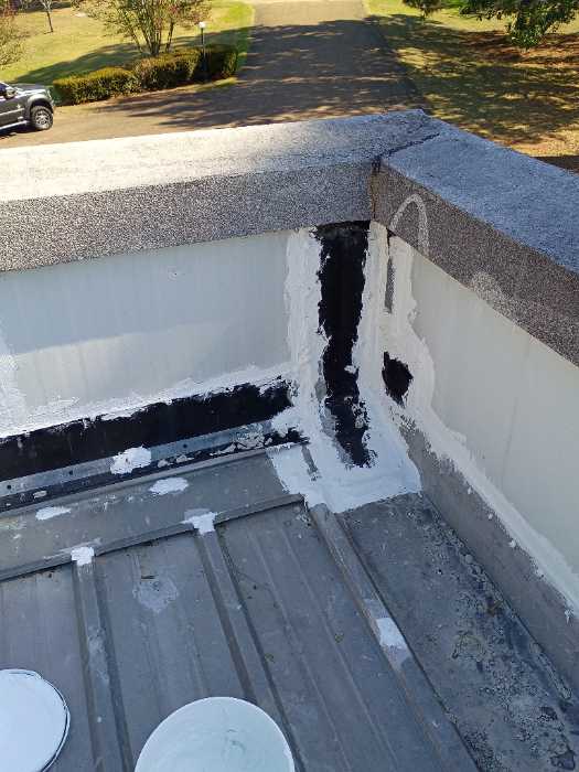 Masking the seams on this roof in Madison, MS, photo 2