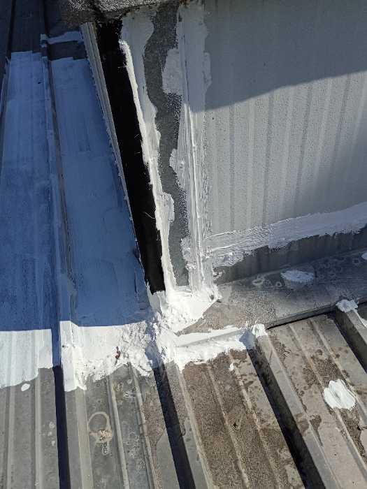 Masking the seams on this roof in Madison, MS, photo 3