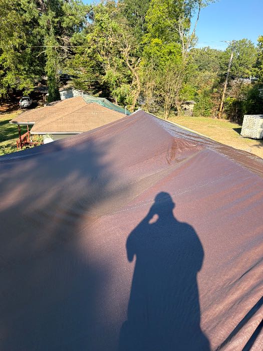 Checking tarp in Pearl, MS, photo 3