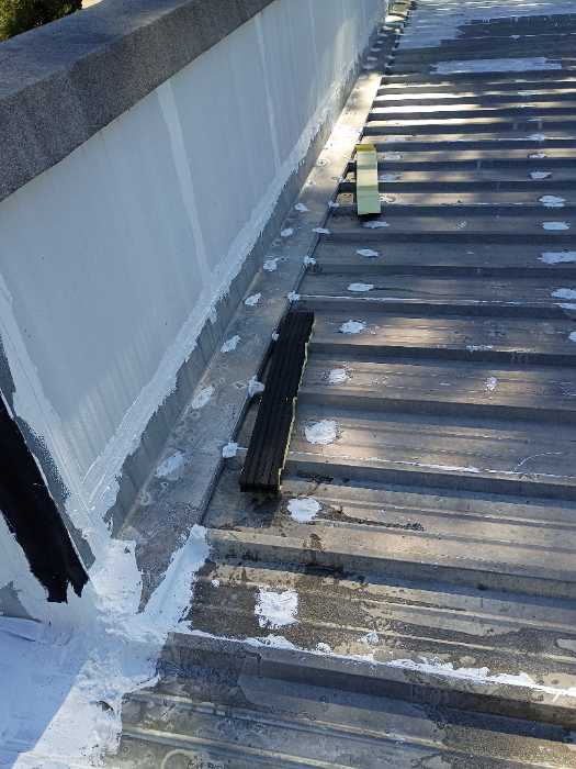 Putting enclosures in at the top of the ridge cap in Madison, MS, photo 2
