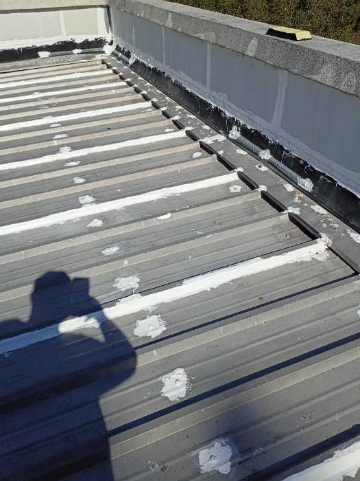 Putting enclosures in at the top of the ridge cap in Madison, MS, photo 4