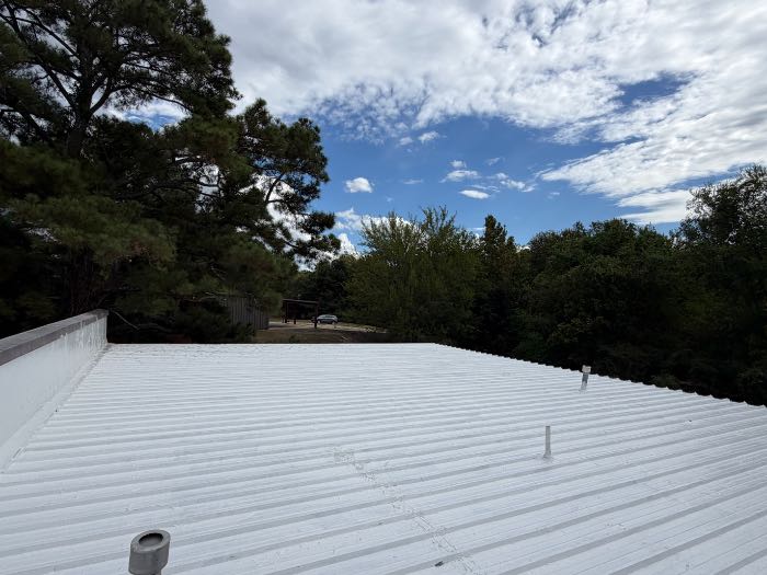 Installed silicone roof system with a pull test in Madison, MS, photo 2