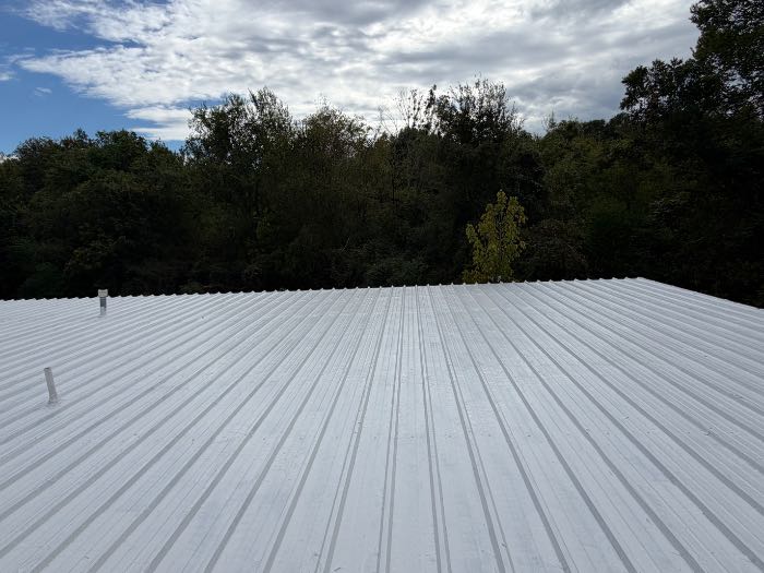 Installed silicone roof system with a pull test in Madison, MS, photo 3